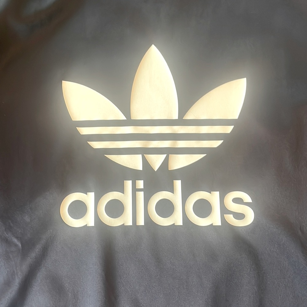 Shiny womens Adidas pull over.